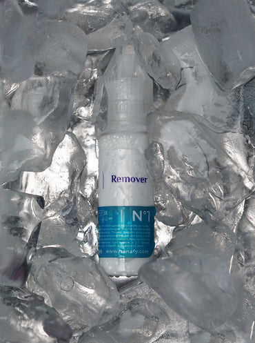 Hanafy Mineral Remover N1 bottle on textured silver background